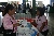 SBCS Customer Service Team Leader, Tricia Maharaj, explains SBCS programmes to visitor