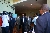 Acting Prime Minister, Errol Mc Leod and AMCHAM President Simon Aqui arrive at the HSSE Conference to view the booths