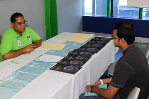 Course Administrator-Dipnarine Ramlochan advising potential student