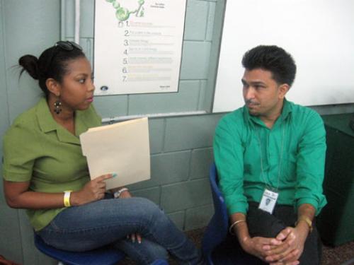 Member of  CEC Champ Fleurs Team chats with potential student