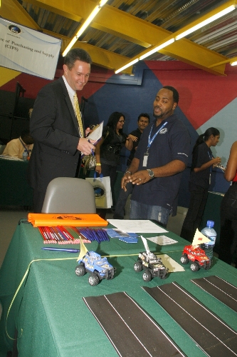A representative from the US Embassy (left) participates in another fun game