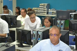 Dr. Tran lending support during the introduction to UOG’s eLearning platform 