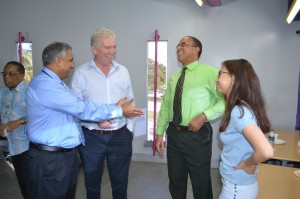 Executive Director, Dr. Robin Maraj shares a light moment at the Social Mixer 